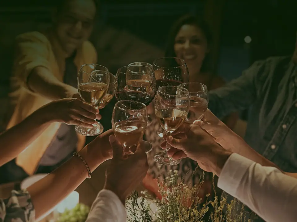 A toast at the table with friends